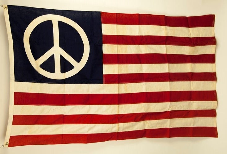 american flag with peace sign on it.jpg